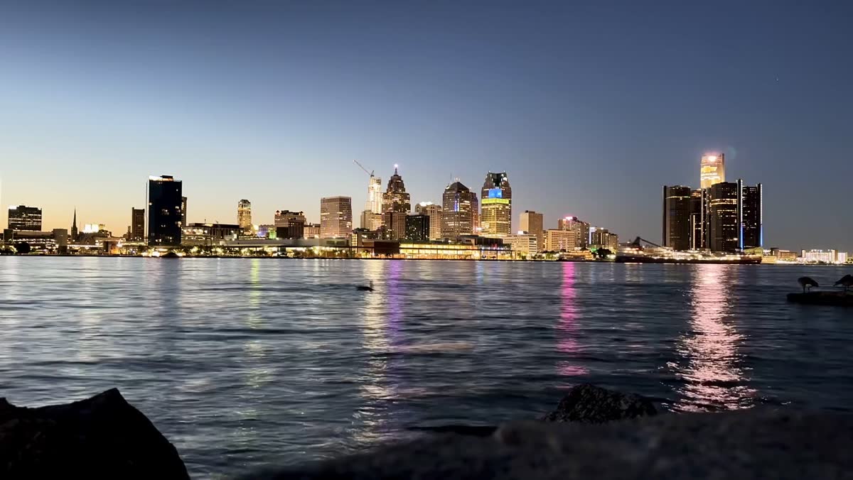 Detroit skyline at twilight reflected in the Detroit River